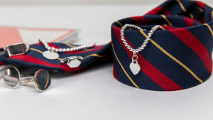 Graduation jewellery. Customised with an engraved design bespoke to your school and graduation year. A tangible symbol that connects students to their school community. 